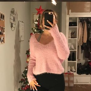 Fuzzy pink sweater. Size medium. New w tags